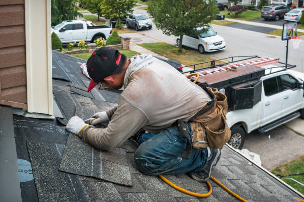 Professional Gutter Repair And Installation technician working in Manchaug, MA